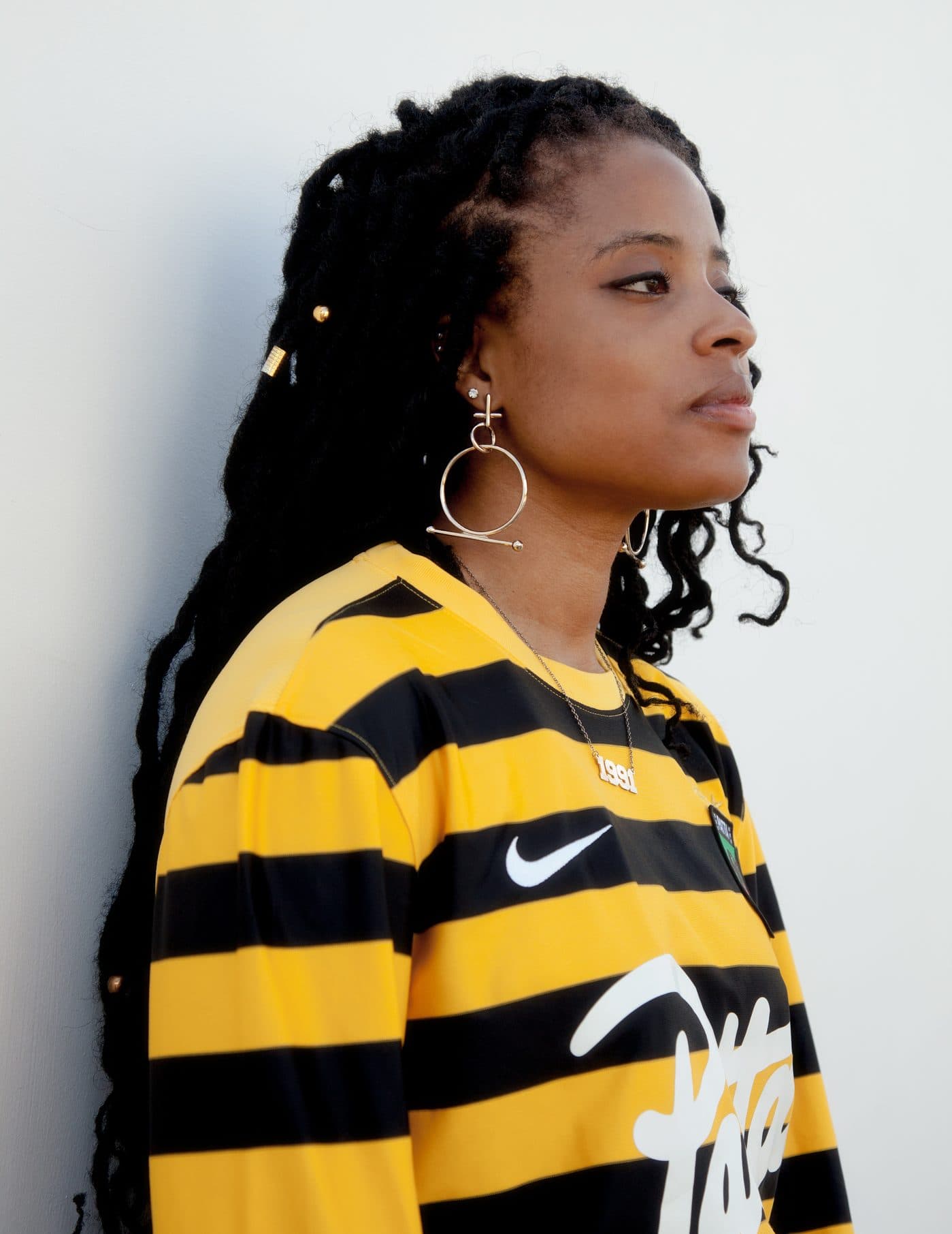 Felicia Pennant in a striped football shirt